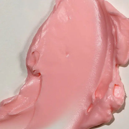 Close-up of pink, glossy TREE HUT Whipped Body Butter Watermelon on a white background