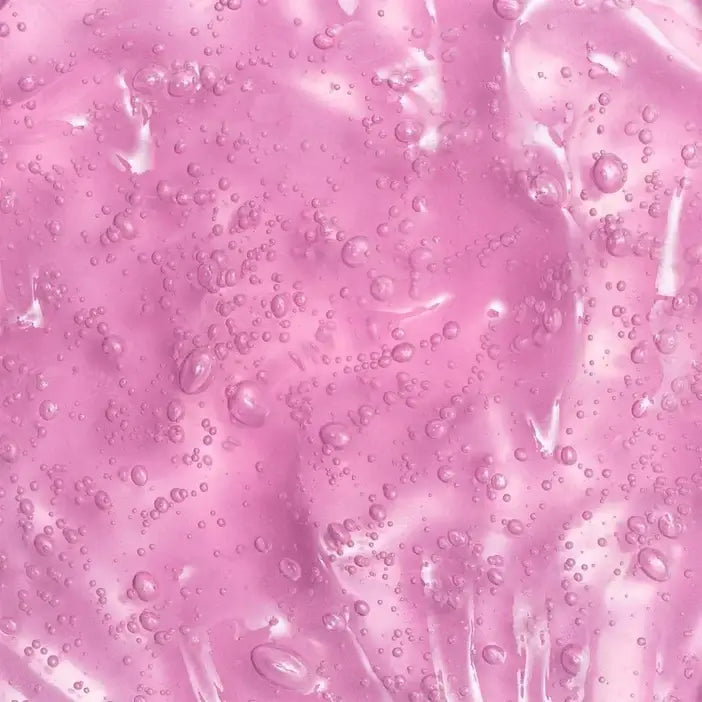 Close-up of pink liquid with bubbles
