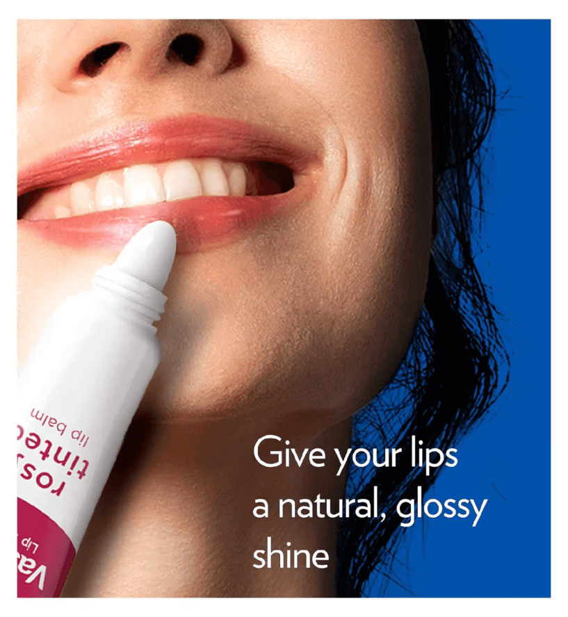 Woman applying Vaseline Rosy Tinted Lip Balm for a natural, glossy shine on her lips.