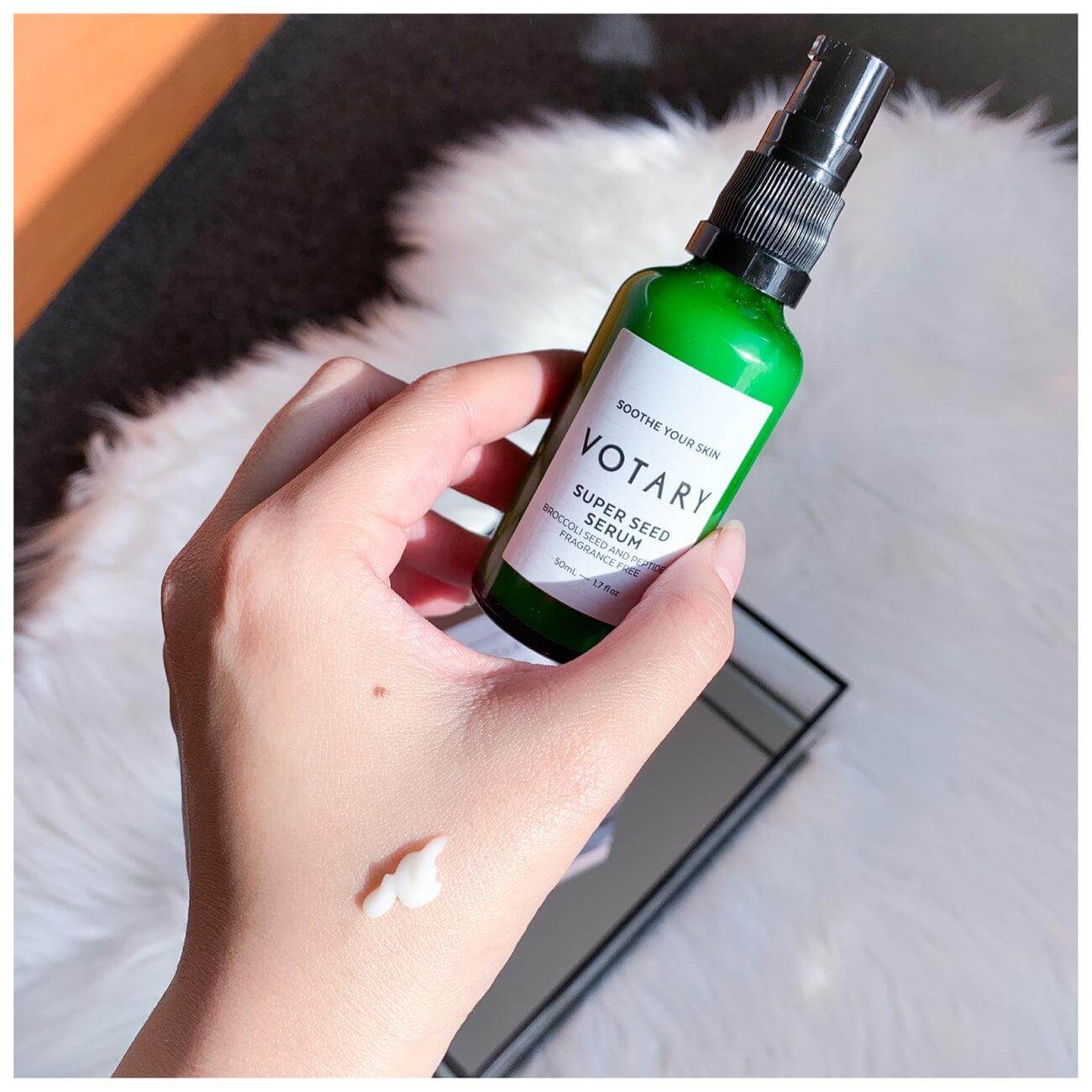 Votary Super Seed Serum in hand, showing its calming properties and texture for sensitive skin.