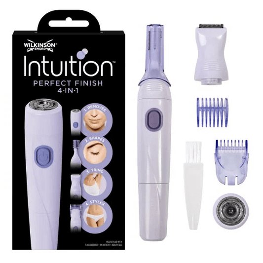 Wilkinson Intuition Perfect Finish 4-in-1 grooming tool with packaging and attachments on a white background