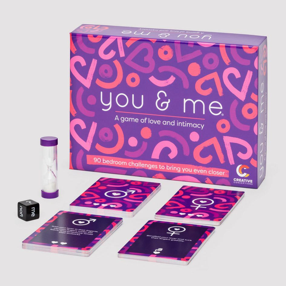 You & Me game box with cards and a hourglass on a white background