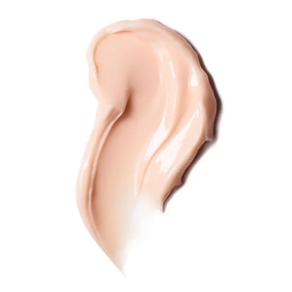 Swatch of Shiseido Vital Perfection Uplifting and Firming Cream in a creamy pink texture.