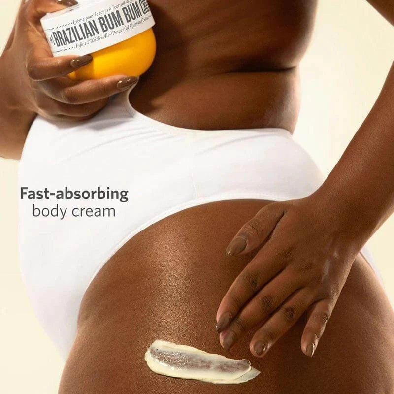 Sol de Janeiro Bum Bum Cream applied to skin, showcasing fast-absorbing body cream with a smooth texture.