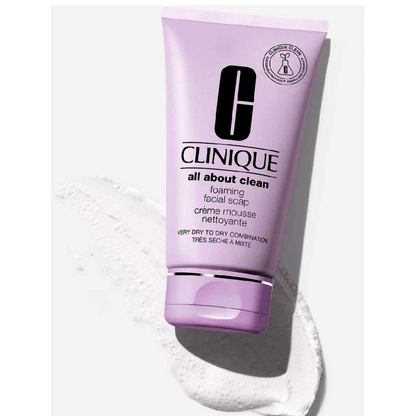 CLINIQUE All About Clean™ Foaming Facial Soap, 150ml tube with creamy texture on a light surface.