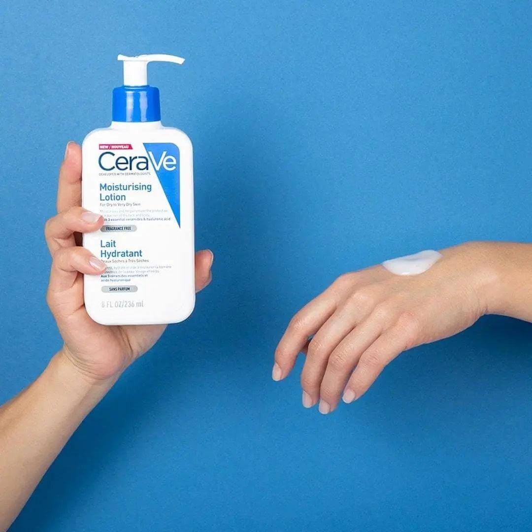 CeraVe Moisturising Lotion 236ml displayed with a hand applying the product on a blue background.