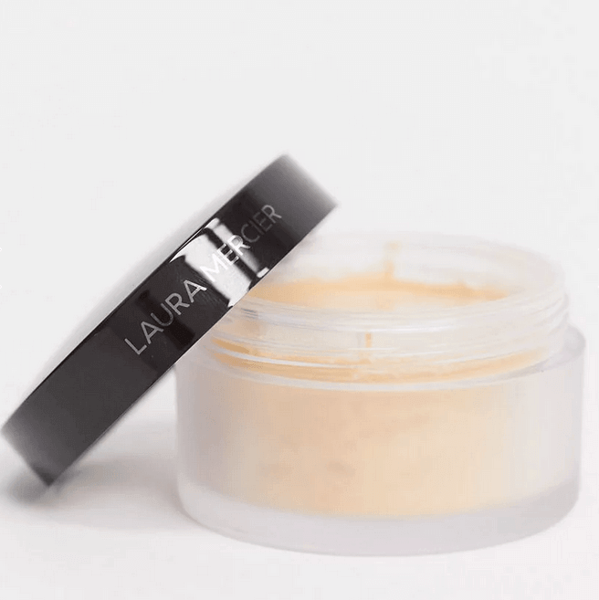 Laura Mercier Travel Size Translucent Setting Powder in Honey, smooth application, 16-hour matte finish, 9.3g jar.