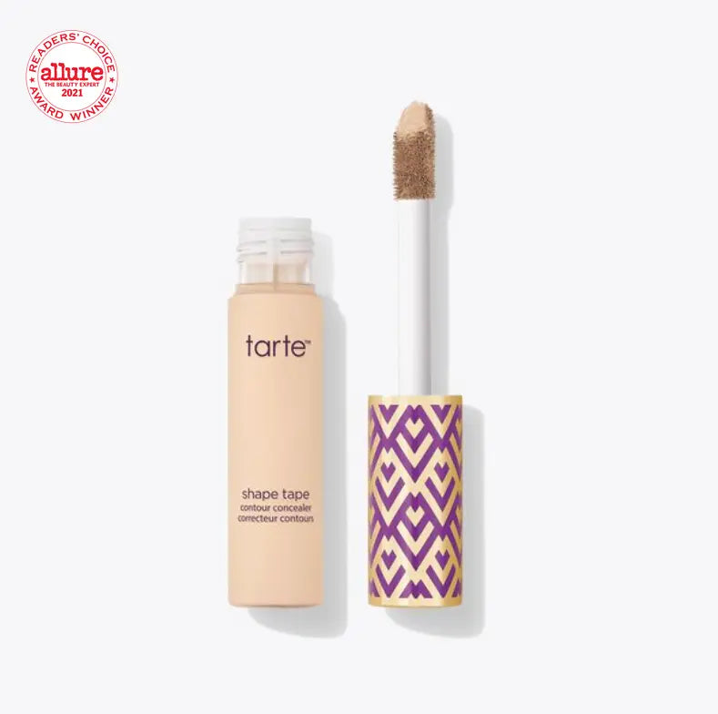TARTE Shape Tape Concealer in Light Sand with applicator, showcasing its blendable formula and vibrant packaging.