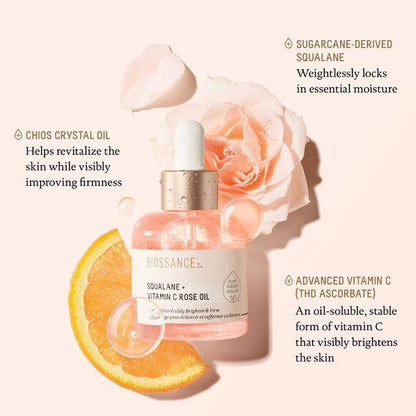 Biossance Squalane + Vitamin C Rose Oil with rose and orange slice, highlighting skin hydration and firmness.