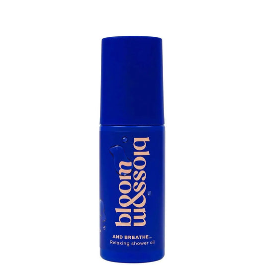 Bloom & Blossom Bath Oil 100ml in blue bottle for a spa-like moisture experience at home.