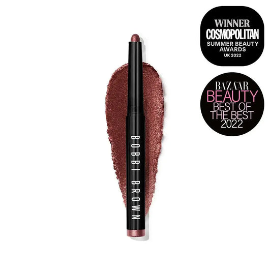 Bobbi Brown Long-Wear Cream Shadow Stick Mulberry with award stickers, showcasing a rich mulberry color swatch.