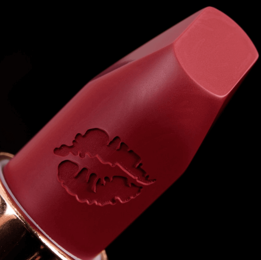 Close-up of Charlotte Tilbury Hot Lips 2 Viva La Vergara lip color, showcasing its rich red shade and embossed lips design.