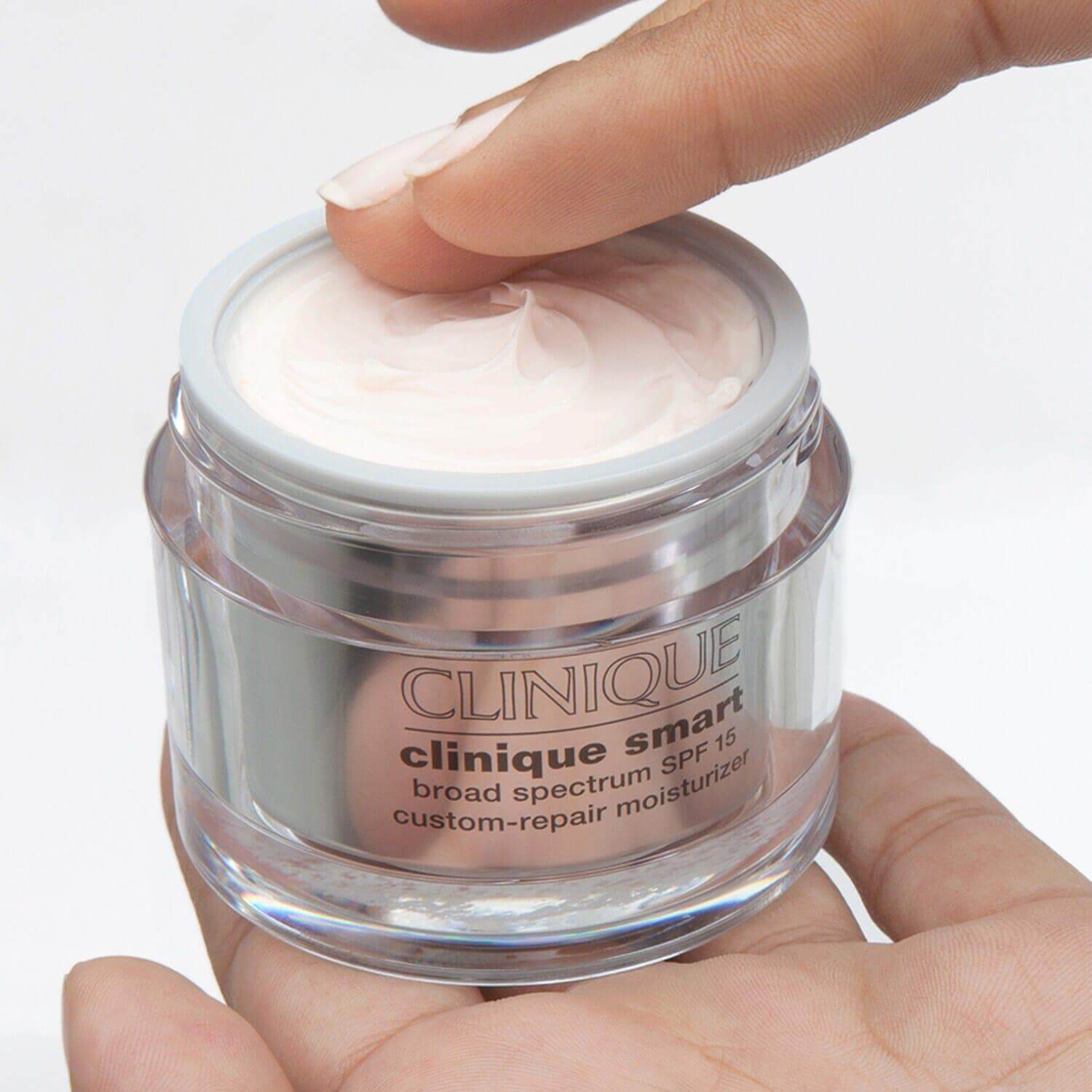 CLINIQUE Smart™ SPF 15 Custom Moisturizer in a jar, highlighting its smooth texture and skincare benefits.