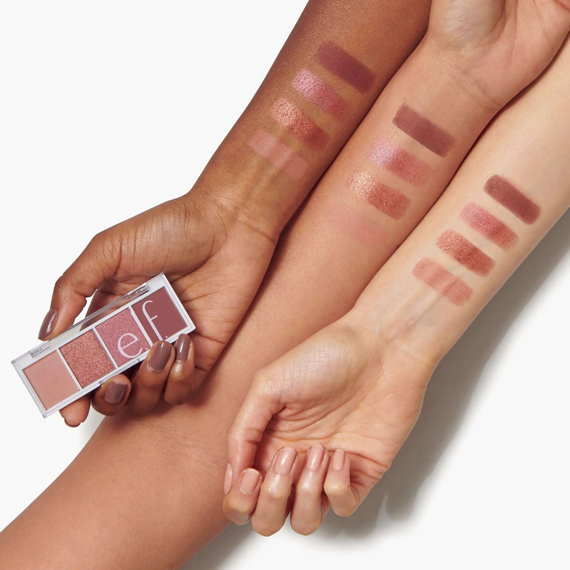 e.l.f. Bite Size Eyeshadows - Berry Bad swatches on diverse arms showcasing creamy matte and shimmer shades.