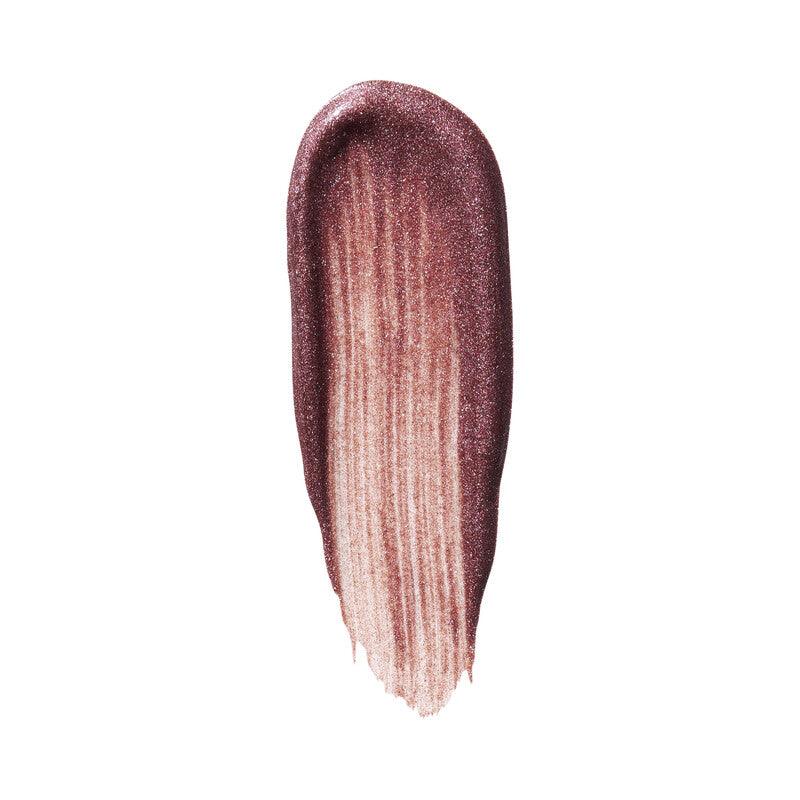 Swatch of e.l.f Halo Glow Blush in a pearlescent burgundy shade, showcasing its radiant liquid formula.