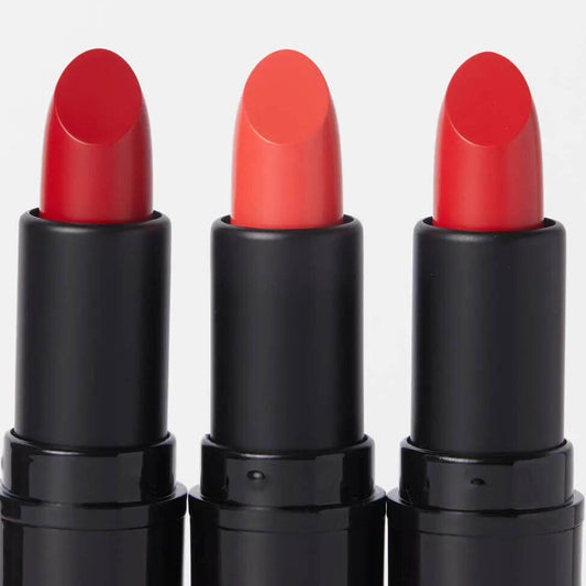 Revolution Pro Lipstick Collection Matte Reds featuring three vibrant red lipstick shades in sleek black tubes.