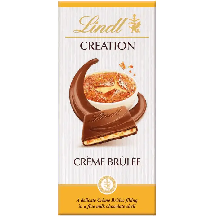 Lindt CREATION Creme Brulee Bar 150g with chocolate shell and creamy filling, inspired by the classic dessert.