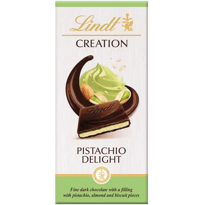 Lindt CREATION Dark Pistachio Bar 150g with rich chocolate and pistachio filling in elegant packaging.