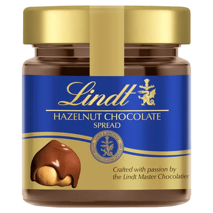 Lindt Hazelnut Chocolate Spread 200g jar, crafted by Lindt Master Chocolatier, perfect for spreads and desserts.