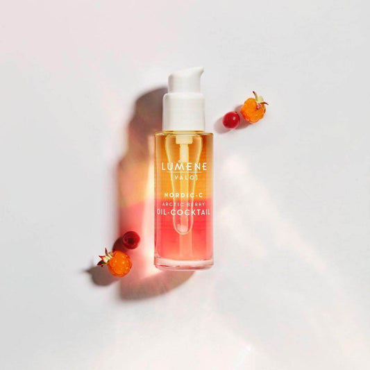 Lumene Nordic-C [VALO] Arctic Berry Oil Cocktail 30ml bottle with berries, promoting luminous, hydrated skin.