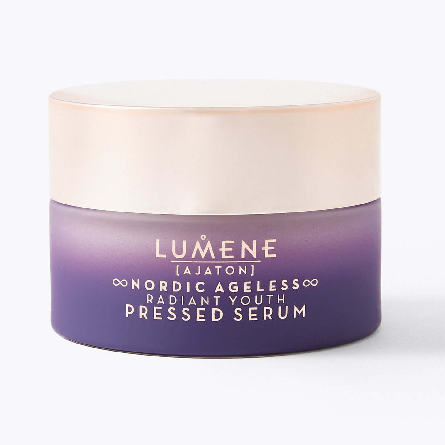 Lumene Nordic Ageless Radiant Youth Pressed Serum 15ml jar with a sleek design for rejuvenating skin care.