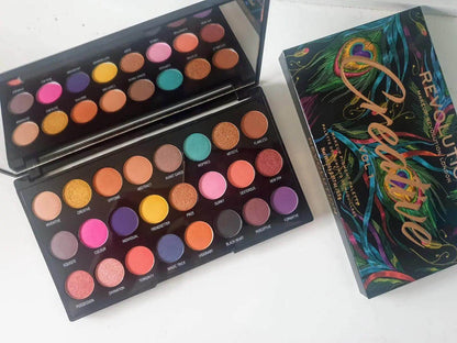 Makeup Revolution Creative Vol 1 Palette showcasing 24 vibrant eyeshadow shades in bold and shimmering finishes.
