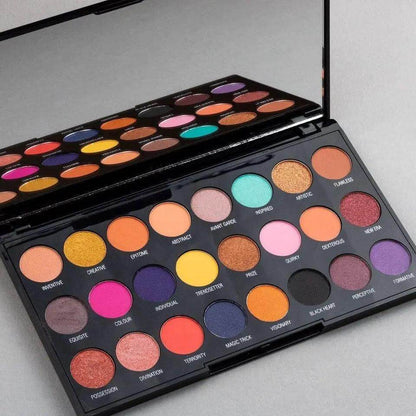 Makeup Revolution Creative Vol 1 Palette with 24 vibrant eyeshadows in bold brights, shimmers, and mattes.