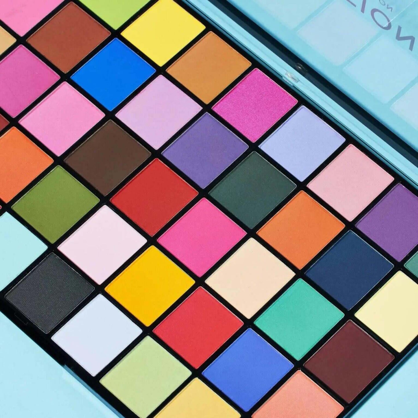 Revolution Maxi Reloaded Palette Monster Mattes featuring 45 vibrant matte eyeshadow shades for creative makeup looks.