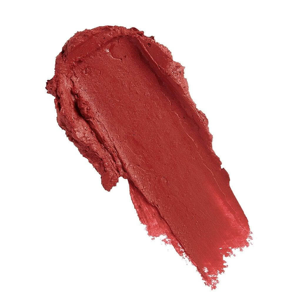 Swatch of Makeup Revolution Satin Kiss Lipstick in Ruby, a rich, deep ruby red shade on a smooth surface.