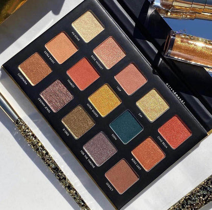 Milani Gilded Gold Palette showing 15 hyper-pigmented shades including golds, neutrals, and a bold jade color.