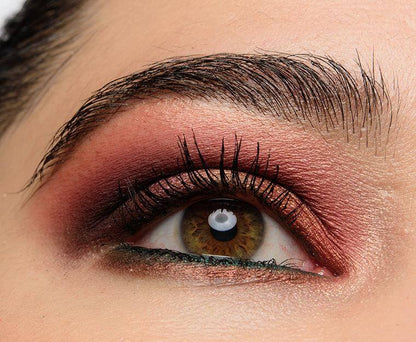Close-up of a bold eye makeup look featuring vibrant shades from the NARS Extreme Effects Eyeshadow Palette.