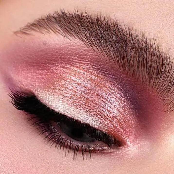 Close-up of an eye makeup look featuring pink and lilac shades from the Natasha Denona Mini Love Eyeshadow Palette.