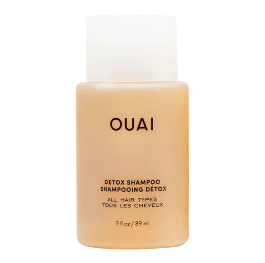 OUAI Detox Shampoo bottle for all hair types, clarifying formula with apple cider vinegar and rose fragrance.