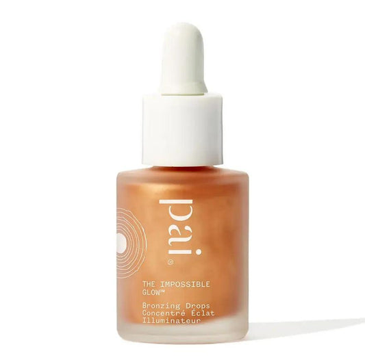 Pai Skincare The Impossible Glow Bronzing Drops 10ml in an elegant dropper bottle, providing natural radiance for all skin tones.