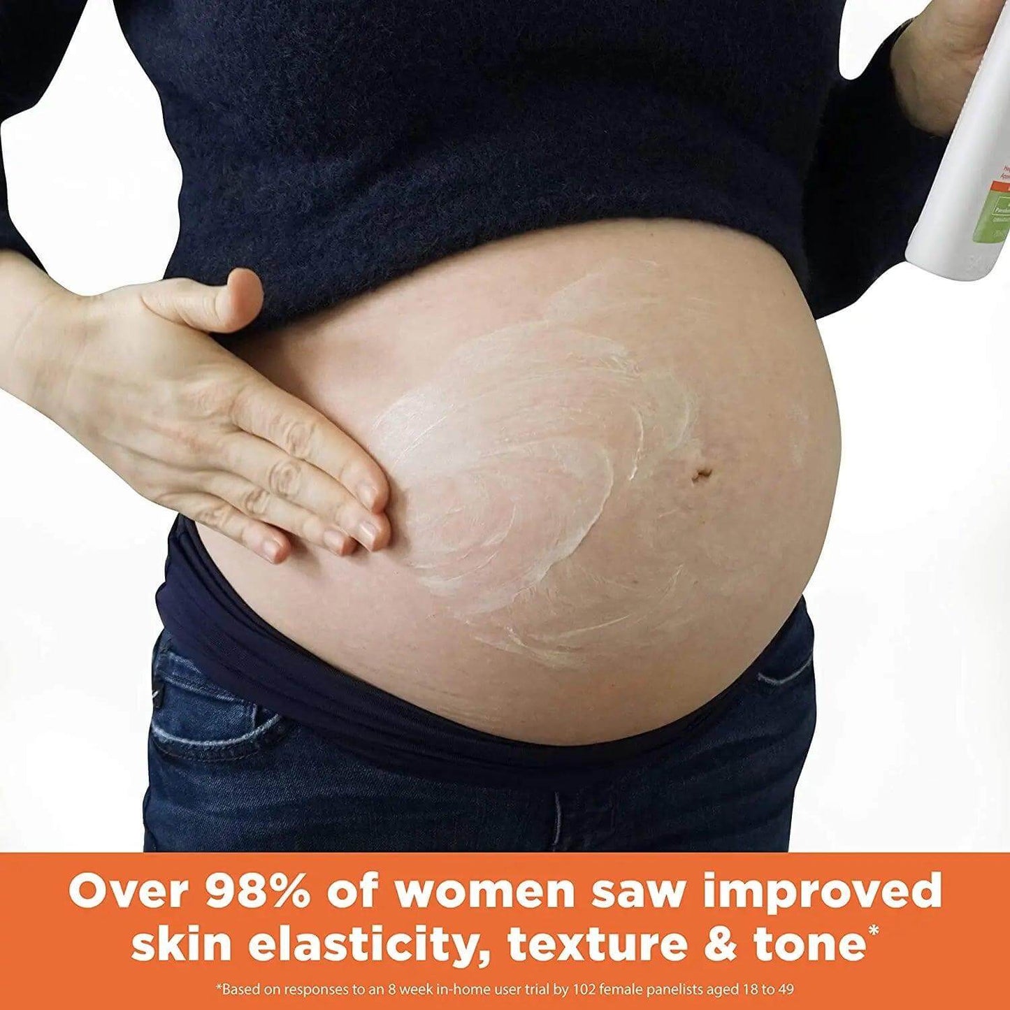 Pregnant woman applying Palmer's Cocoa Butter Stretch Mark Lotion for improved skin elasticity and tone.
