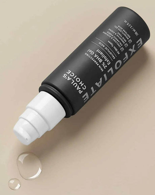 Paula's Choice 2% BHA Gel Exfoliant 100ml with a drop of product, designed to smooth skin and reduce blackheads.