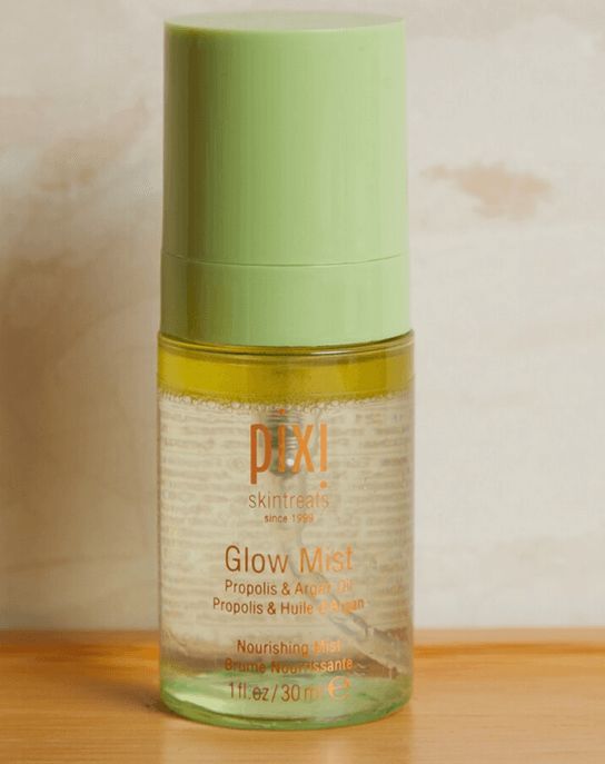 PIXI Glow Mist 30ml bottle with green lid, enriched with natural oils for a dewy, radiant complexion.