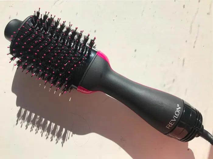 Revlon Pro Collection One Step Dryer & Volumiser, a 2-in-1 styling tool for drying and volumizing hair.