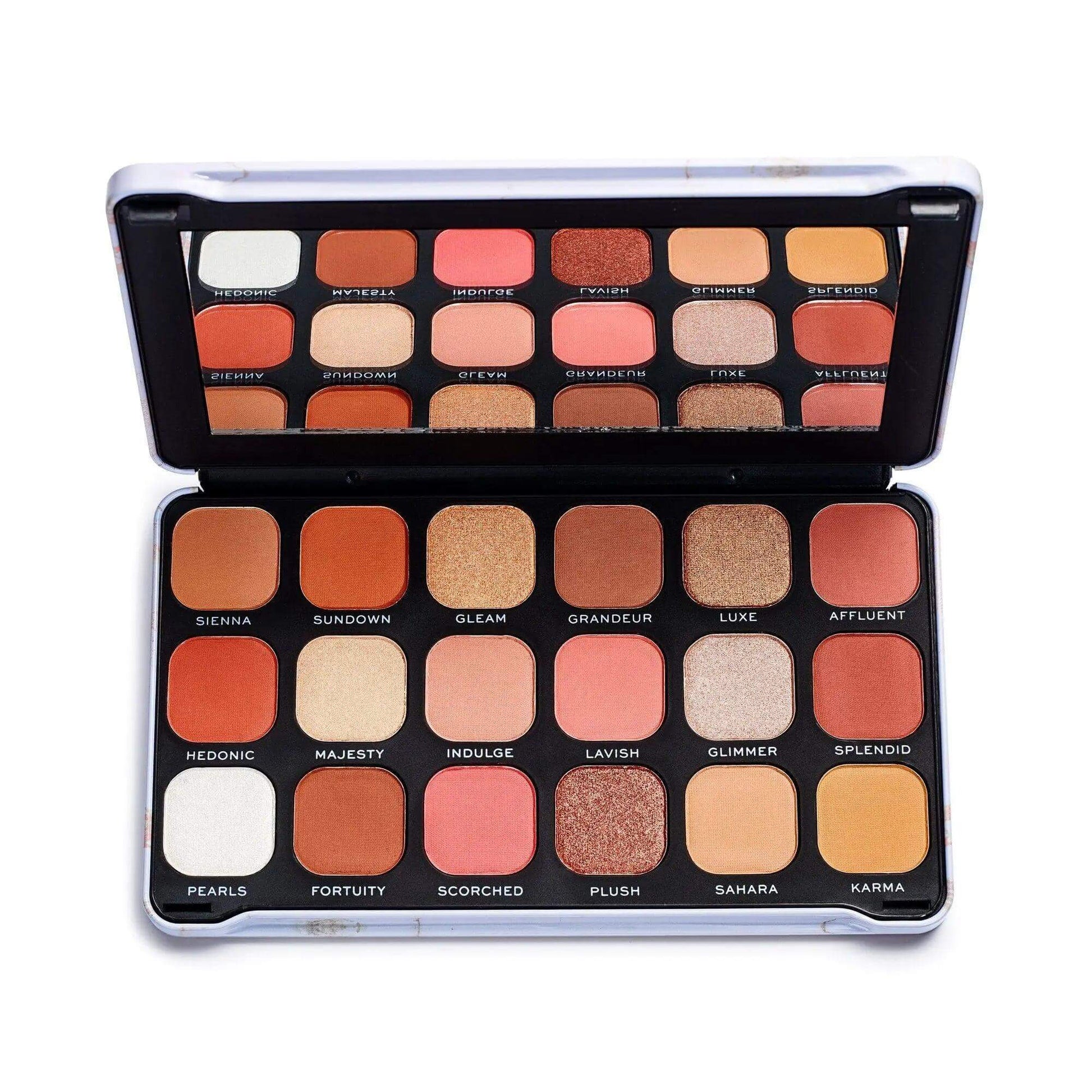Revolution Forever Flawless Decadent Eyeshadow Palette with 18 rich matte and shimmer shades in a sleek design.