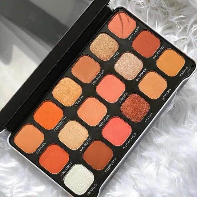 Revolution Forever Flawless Decadent Eyeshadow Palette with 18 rich shades in matte and shimmer finishes.
