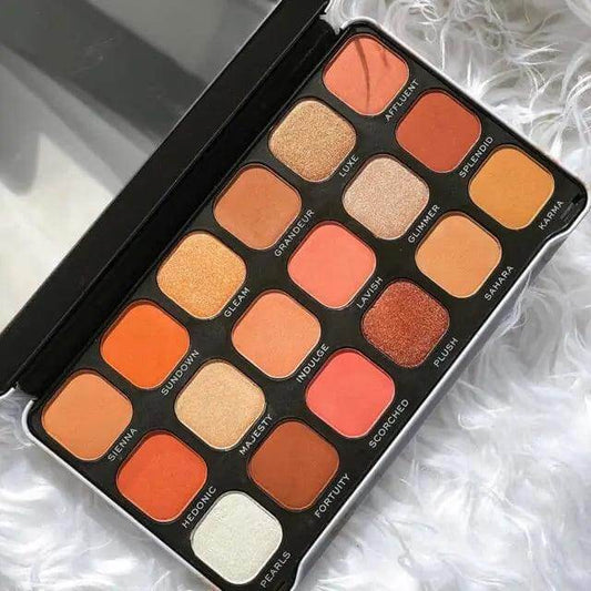 Revolution Forever Flawless Decadent Eyeshadow Palette with 18 rich shades in matte and shimmer finishes.
