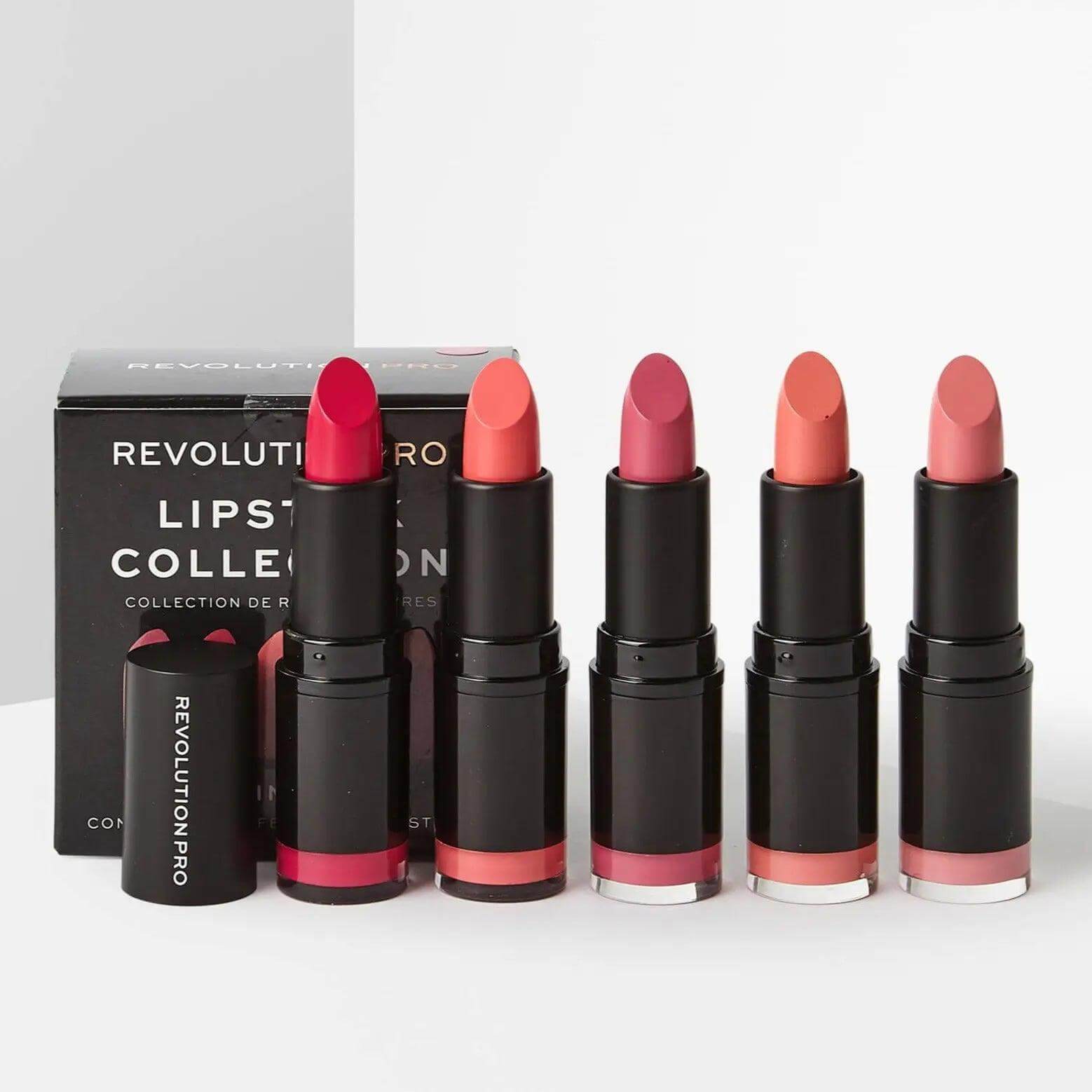 Revolution Pro Lipstick Collection Pinks set featuring five creamy satin pink lipsticks in sleek packaging.