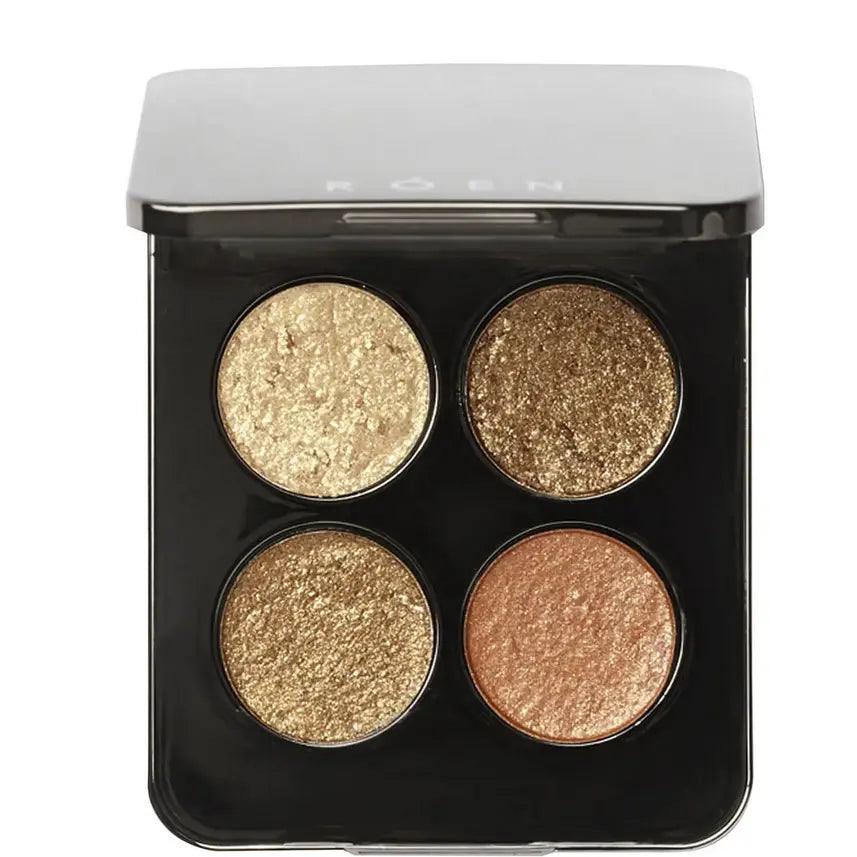 RÓEN 75° Warm Eyeshadow Palette featuring four foil-effect, warm eyeshadows in golden and burnished tones.