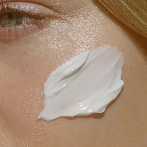 Close-up of Summer Fridays Jet Lag Mask applied on cheek, showcasing its creamy texture for hydration.
