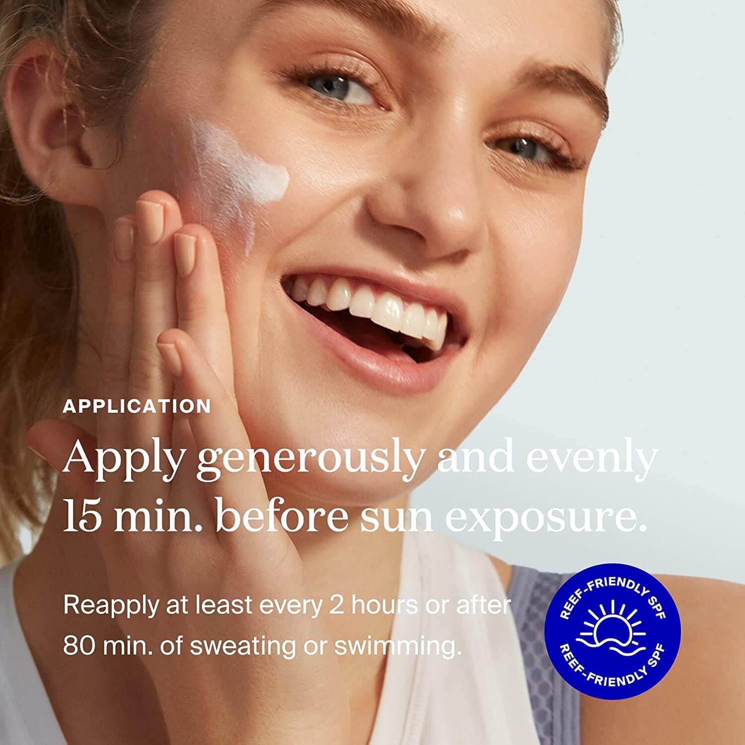 Woman applying Supergoop sunscreen lotion to her face, illustrating sun protection application instructions.