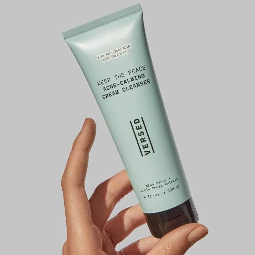 VERSED Keep The Peace Blemish-Calming Cream Cleanser 120ml in hand, soothing formula for acne-prone skin.