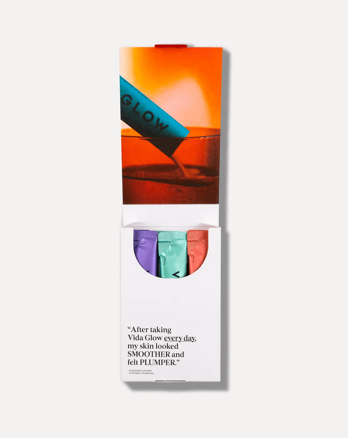 Vida Glow Natural Marine Collagen powder packets in vibrant packaging promoting smoother, plumper skin and healthy hair.