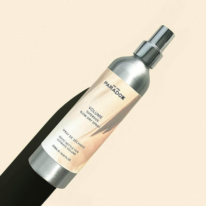 We Are Paradoxx Volume Supersize Blow Dry Spray 250ml for voluminous hair and glossy finish.