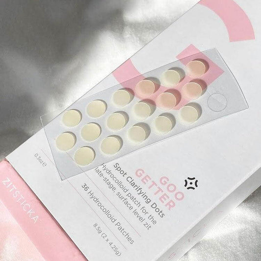 ZITSTICKA Goo Getter Spot Clarifying Dots pack featuring 36 hydrocolloid patches for acne treatment.